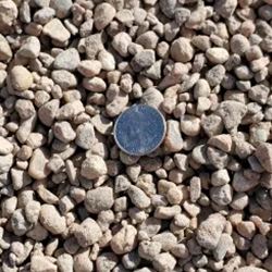 Gray round 3/8 inch gravel, a versatile and compact landscaping material, available at Albuquerque Landscape Supply. This high-quality gravel features a rounded shape and a beautiful gray color, perfect for creating a polished and sleek outdoor space. Use this gravel for pathways, driveways, or as a decorative element to add texture and visual appeal to your landscape design.